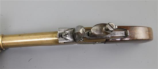 A Belgian brass framed and brass cannon barrelled flintlock boxlock overcoat pistol, 10.5in (14.5in with bayonet)